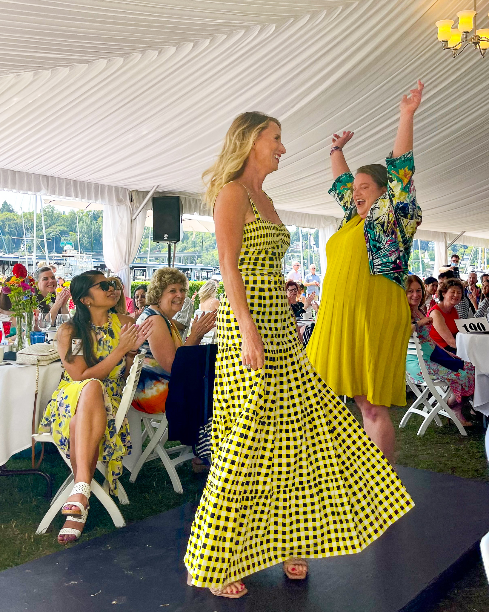 Two models on stage at NW Hope and Healing Fundraiser