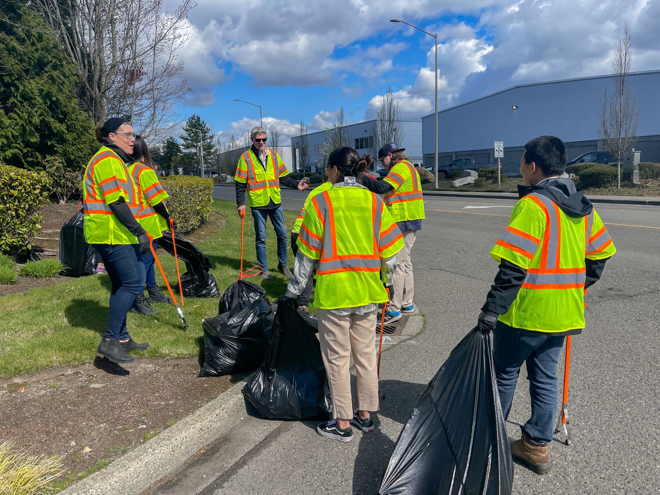 A group of Barghausen employees volunteering to pick up litter