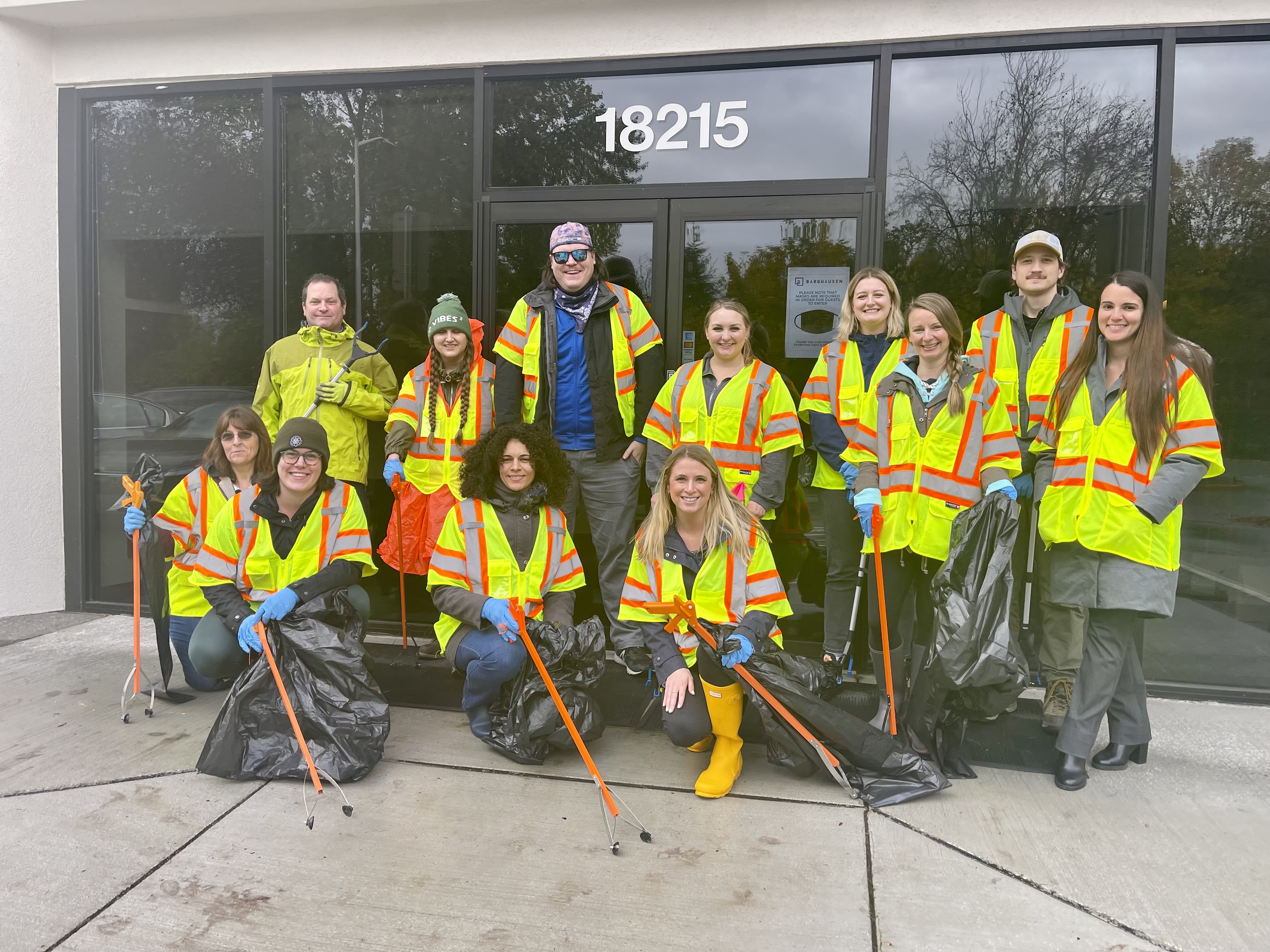A group of Barghausen employees volunteering to pick up trash in the community